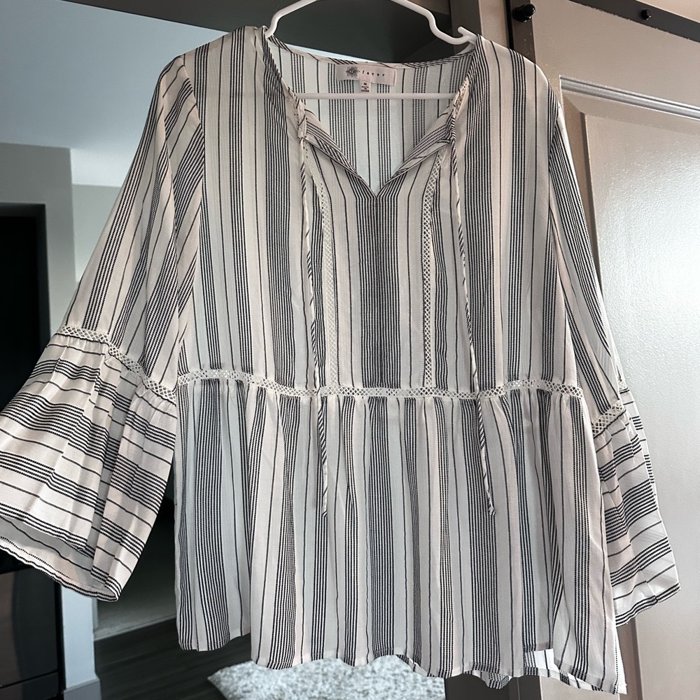 No tags but never worn. Size M light weight top